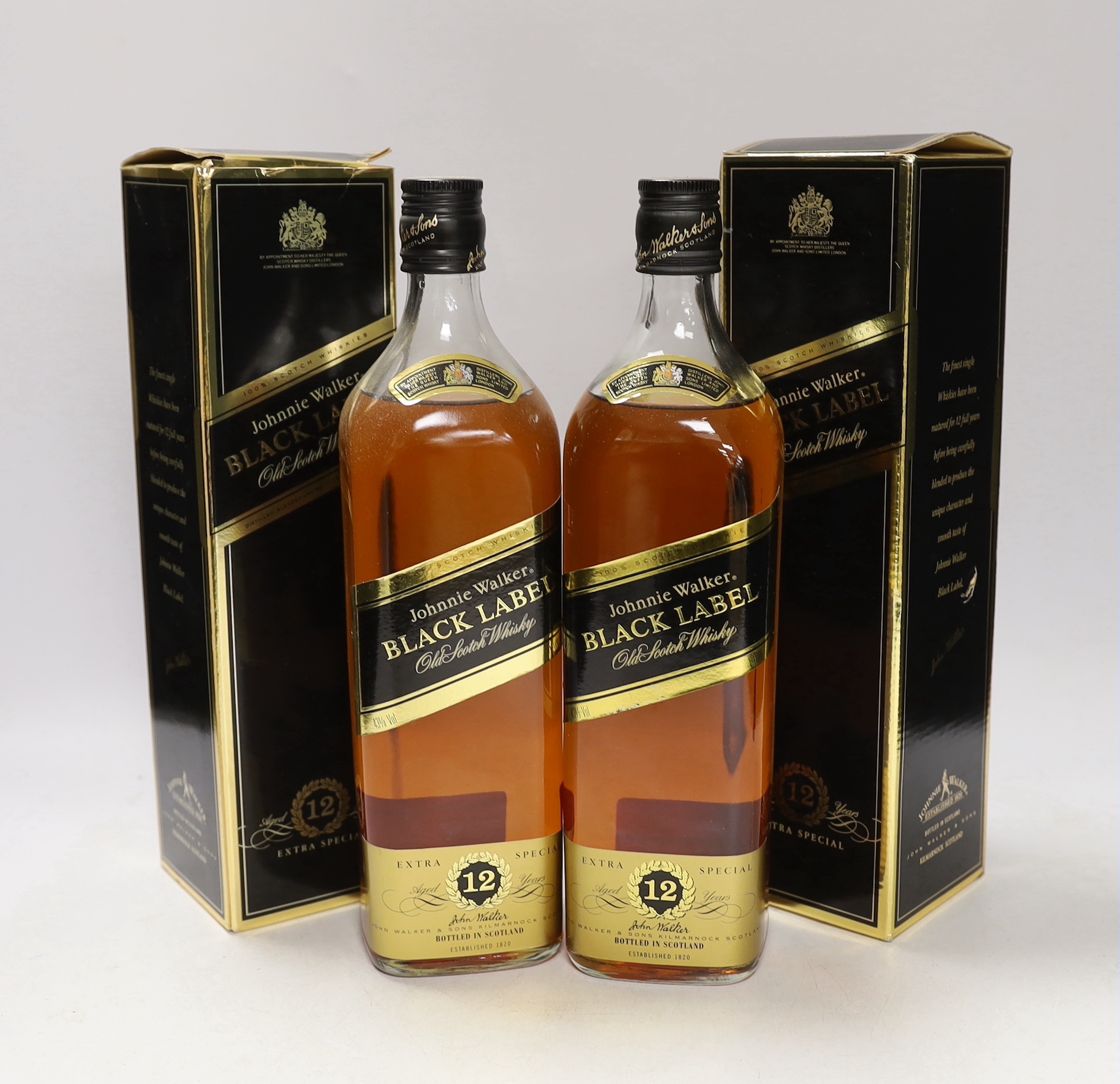 Two bottles of Johnnie Walker 12 year extra special Black Label whisky